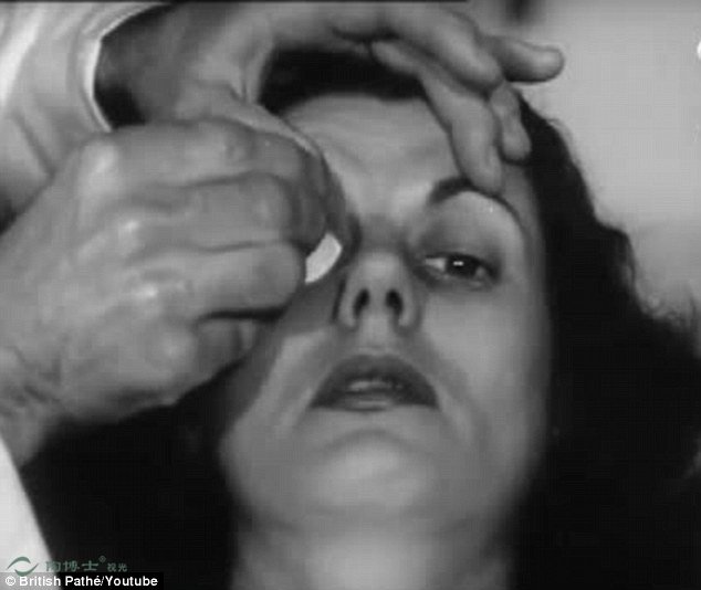 Footage from 1948 shows Australia’s only contact lens maker Penhryn Thomas making a pair on contact lenses for a woman (pictured)